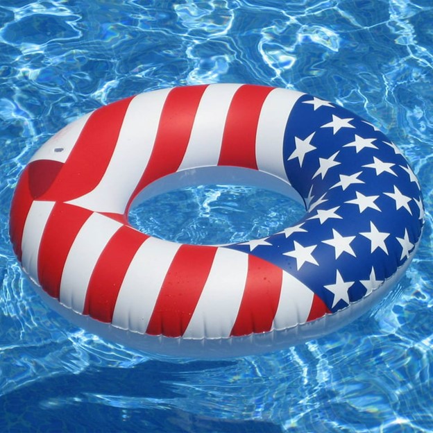 pool ring float with american flag print in water