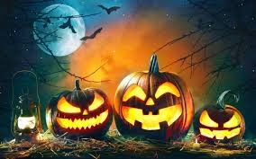 glowing jack o lanterns against a full moon with bats